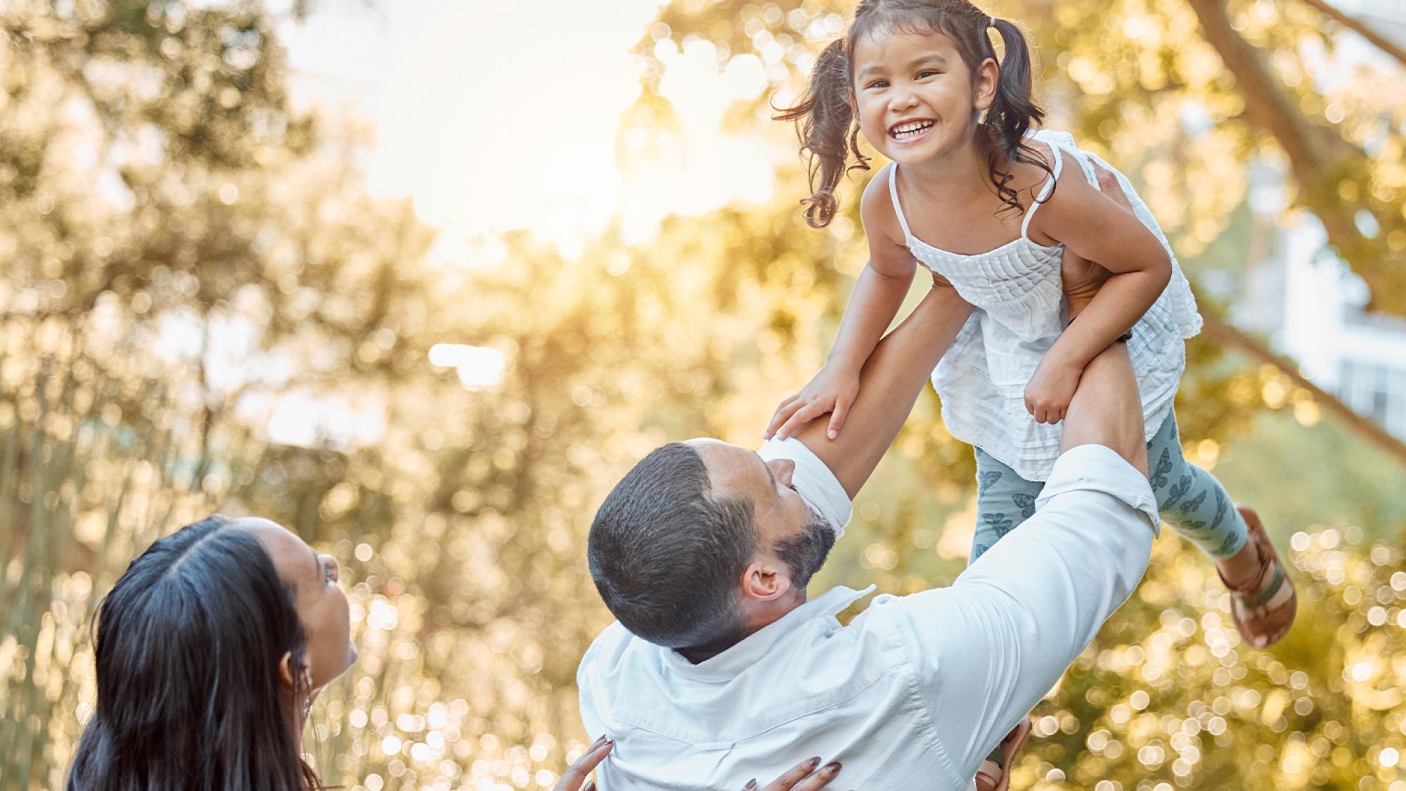 Young family embracing